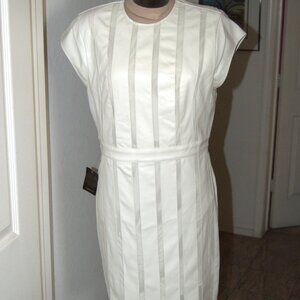Bebe size 12 Off White Vegan leather with mesh inserts mini-Dress